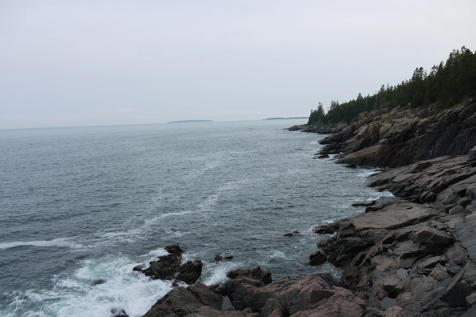Waves meeting the rocky Atlantic coastline of Acadia National Park.